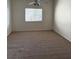 Bedroom featuring neutral walls, carpet flooring, a ceiling fan, and a window to let in natural light at 1881 W Alexander Rd # 2093, North Las Vegas, NV 89032