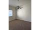 Cozy bedroom with natural light and a modern ceiling fan at 1881 W Alexander Rd # 2093, North Las Vegas, NV 89032