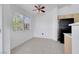Bright dining area with tile floors and a window with views of lush greenery at 1881 W Alexander Rd # 2093, North Las Vegas, NV 89032