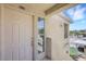 Front door with sidelight window, providing ample natural light at 1881 W Alexander Rd # 2093, North Las Vegas, NV 89032