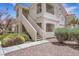 Close up of condo building with private entryway and neat landscaping at 1881 W Alexander Rd # 2093, North Las Vegas, NV 89032