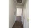 Hallway with carpet and multiple doors at 1881 W Alexander Rd # 2093, North Las Vegas, NV 89032