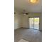 Cozy living space with a sliding glass door leading to the outdoor balcony at 1881 W Alexander Rd # 2093, North Las Vegas, NV 89032