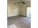 Spacious living area filled with natural light from the sliding patio doors at 1881 W Alexander Rd # 2093, North Las Vegas, NV 89032