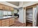Open layout featuring a kitchen, dining area and pantry, with stainless steel appliances and granite countertops at 2035 E Warm Springs Rd # 1019, Las Vegas, NV 89119