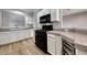 Well-lit kitchen featuring modern appliances, sleek countertops, and ample cabinet space at 2050 W Warm Springs Rd # 4021, Henderson, NV 89014