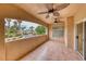 Spacious outdoor covered patio features tile flooring and ceiling fans, perfect for relaxing at 2050 W Warm Springs Rd # 4021, Henderson, NV 89014