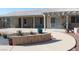 Spacious backyard patio with concrete landscaping features at 2201 E Dandelion St, Pahrump, NV 89048