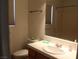 Cozy bathroom featuring tile counter and neutral wall paint at 2201 E Dandelion St, Pahrump, NV 89048