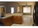 Open kitchen area with a view to the dining area, complete with tiled floors at 2201 E Dandelion St, Pahrump, NV 89048