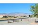 Scenic street view showcasing the community and mountain range backdrop on a clear, sunny day at 2201 E Dandelion St, Pahrump, NV 89048