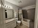Bathroom featuring a shower-tub combo with decorative tile surround at 2451 N Rainbow Blvd # 1123, Las Vegas, NV 89108