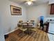Bright dining area with a round table, seating for four, and stylish decor at 2451 N Rainbow Blvd # 1123, Las Vegas, NV 89108