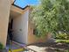 Exterior view of a multi-story building with lush trees at 2451 N Rainbow Blvd # 1123, Las Vegas, NV 89108