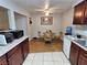 Modern kitchen connected to dining area, showcasing updated appliances and ample counter space at 2451 N Rainbow Blvd # 1123, Las Vegas, NV 89108