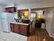 Open-concept view with a well-lit living room and seamless transition into the kitchen at 2451 N Rainbow Blvd # 1123, Las Vegas, NV 89108