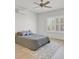 Comfortable bedroom with bright, shuttered windows and ceiling fan provides a relaxing retreat at 2548 Leighton Ave, Henderson, NV 89052