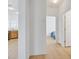 Bright hallway showcases seamless transition from kitchen to bedroom at 2548 Leighton Ave, Henderson, NV 89052