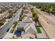 An aerial view displays the neighborhood street and the home's backyard at 2625 Cattrack Ave, North Las Vegas, NV 89081