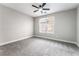 Neutral bedroom featuring plush carpet and a large window at 2625 Cattrack Ave, North Las Vegas, NV 89081