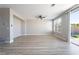 Spacious living room features luxury vinyl plank flooring, recessed lighting, and natural light at 2625 Cattrack Ave, North Las Vegas, NV 89081