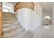 Bright foyer with staircase and tile floors leads into the home at 2728 Aspen Wood Ave, Henderson, NV 89074