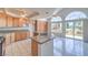 Spacious kitchen features granite countertops, stainless steel appliances, an island, and ample cabinet space at 2728 Aspen Wood Ave, Henderson, NV 89074