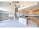 Spacious kitchen features an island, stainless appliances, and bright, natural light at 2728 Aspen Wood Ave, Henderson, NV 89074