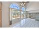 Bright living room featuring large windows and sliding door access to the deck at 2728 Aspen Wood Ave, Henderson, NV 89074