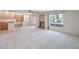 Open concept living room and wet bar with backyard views at 2728 Aspen Wood Ave, Henderson, NV 89074