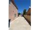Long side yard with block wall and storage shed at 2728 Aspen Wood Ave, Henderson, NV 89074