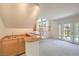 Wet bar area features bar sink and storage with sliding doors to backyard at 2728 Aspen Wood Ave, Henderson, NV 89074