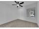 Bedroom with a ceiling fan and view out the window at 3115 Floral Vista Ave, Henderson, NV 89014