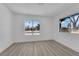 Bedroom with new flooring and large windows offering outdoor views at 3115 Floral Vista Ave, Henderson, NV 89014