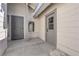 Covered front entrance to home featuring neutral colors and a security door at 3115 Floral Vista Ave, Henderson, NV 89014