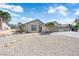 Inviting single-story home featuring desert landscaping and a spacious driveway at 3115 Floral Vista Ave, Henderson, NV 89014