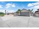 Welcoming single-story house with a well-maintained yard and two car garage at 3115 Floral Vista Ave, Henderson, NV 89014