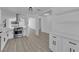 Open-concept kitchen with stainless steel appliances and spacious countertops at 3115 Floral Vista Ave, Henderson, NV 89014
