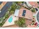 Overhead view of home featuring swimming pool, solar panels, and lush backyard at 3200 Ridgecliff St, Las Vegas, NV 89129