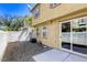 Low-maintenance backyard with gravel landscaping, a small patio, and a privacy wall, ideal for outdoor relaxation and entertaining at 3905 Sweet Pine St # 102, Las Vegas, NV 89108