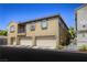 Inviting multi-level home featuring a private balcony and attached two-car garage in a desirable neighborhood at 3905 Sweet Pine St # 102, Las Vegas, NV 89108