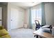 Bright bedroom with large window, closet, and space for a desk at 3922 Painted Lady Ave, Las Vegas, NV 89141