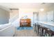Open-concept living space with stairs and kitchen island views at 3922 Painted Lady Ave, Las Vegas, NV 89141