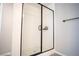Modern bathroom walk-in shower with glass door and tiled walls at 3922 Painted Lady Ave, Las Vegas, NV 89141