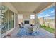 Covered patio with outdoor seating, a fireplace, and a view of the yard at 444 Middlestone Ave, Henderson, NV 89011