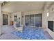 Covered patio with outdoor seating, a fireplace, and a view of the yard at 444 Middlestone Ave, Henderson, NV 89011