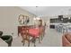 Traditional dining room with large dining table, chandelier, and direct access to kitchen and butler's pantry at 444 Middlestone Ave, Henderson, NV 89011