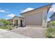 Charming single-Gathering home with a two-car garage, appealing facade, and professional landscaping at 444 Middlestone Ave, Henderson, NV 89011