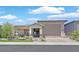 Charming single-story home with manicured lawn, covered porch, and desert landscaping at 444 Middlestone Ave, Henderson, NV 89011
