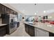 Well-equipped kitchen features stainless steel appliances and an open view of the living spaces at 444 Middlestone Ave, Henderson, NV 89011